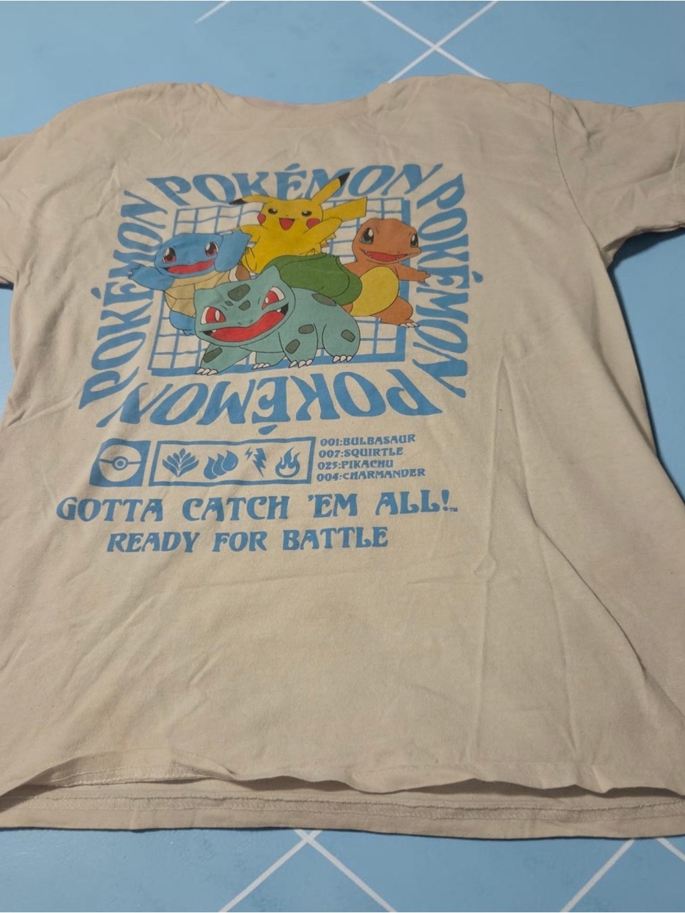 Hot Topic Beige Pokémon Tee with Blue Print